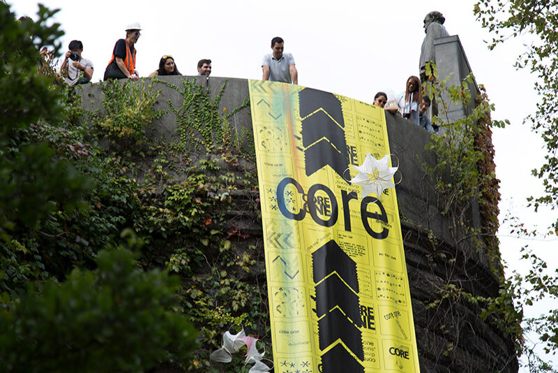 Columbia University students on top of a cliff featuring art display for core project