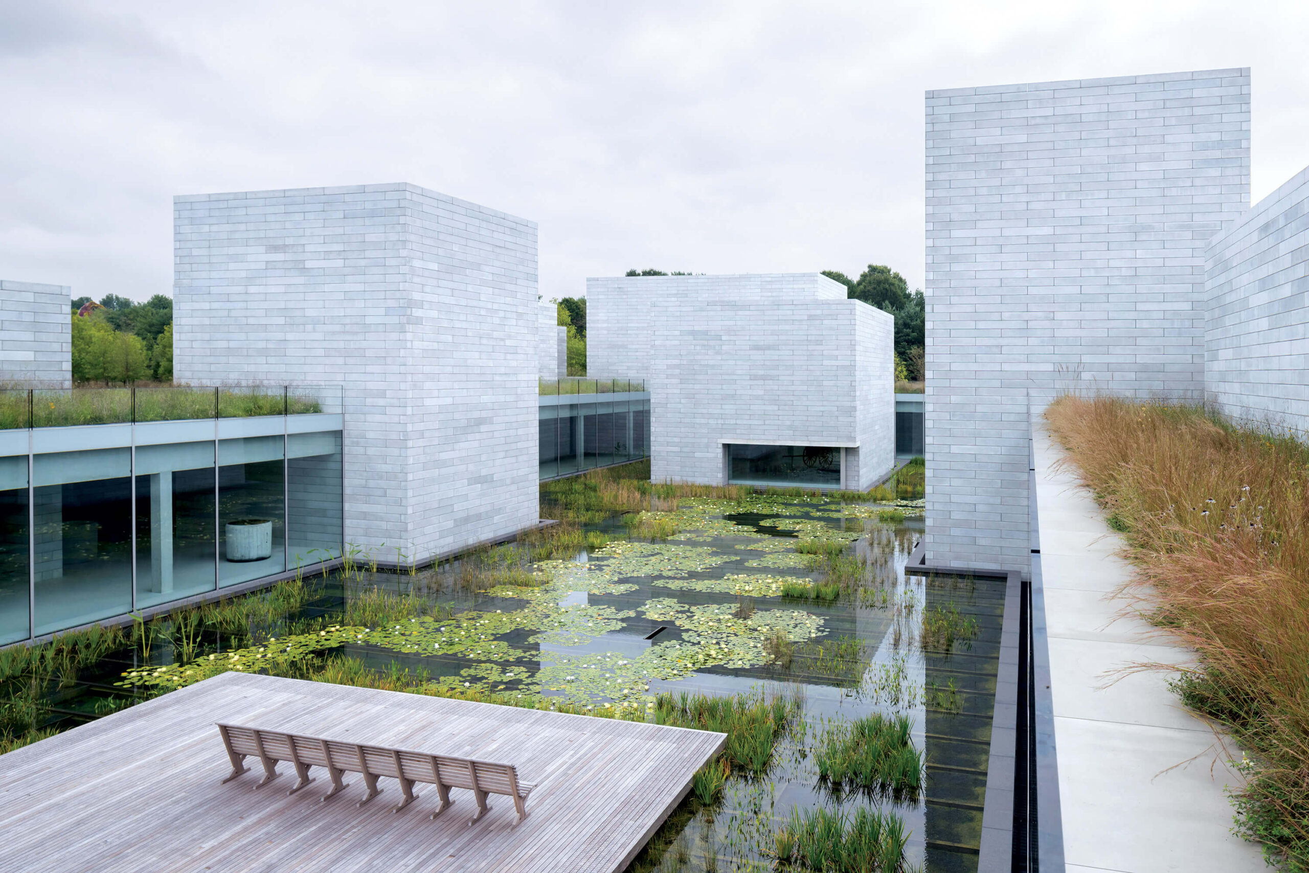 The massing of the Glenstone Pavilions is plotted around a central water feature designed by PWP Landscape Architecture.