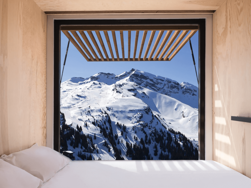 A view of the alps from a shipping container bedroom, designed by Ora Ito