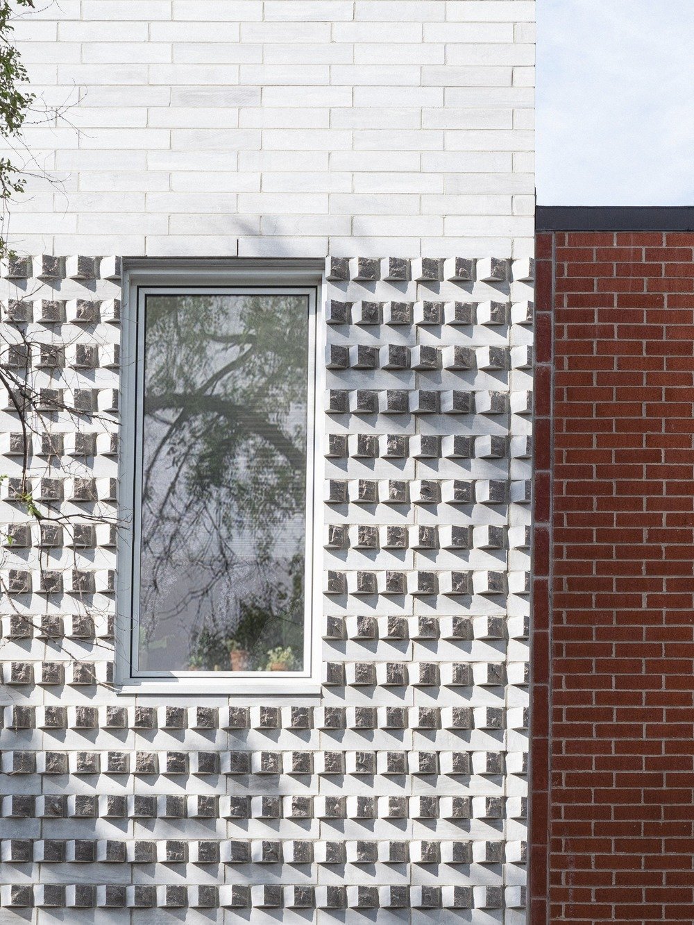 A close-up view of the extruded bricks at Off Plaza