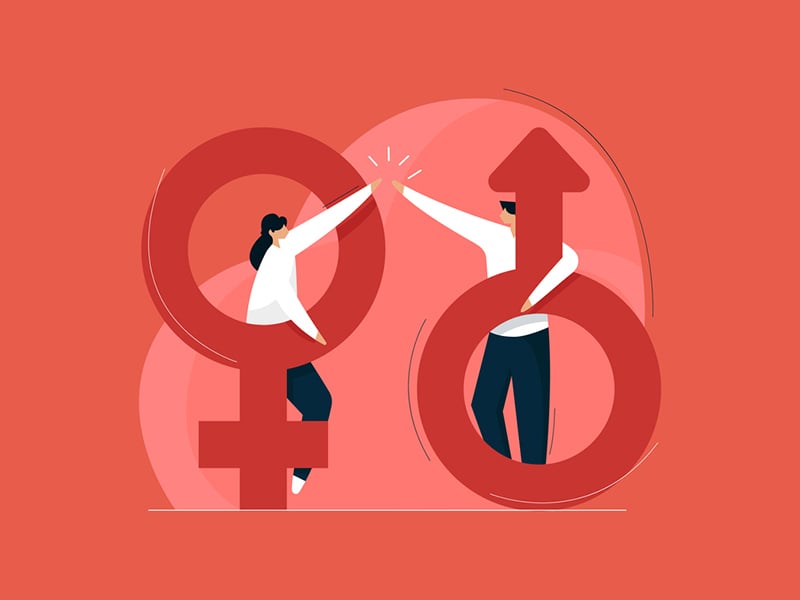 Man and woman high-fiving whilesitting inside gender symbols