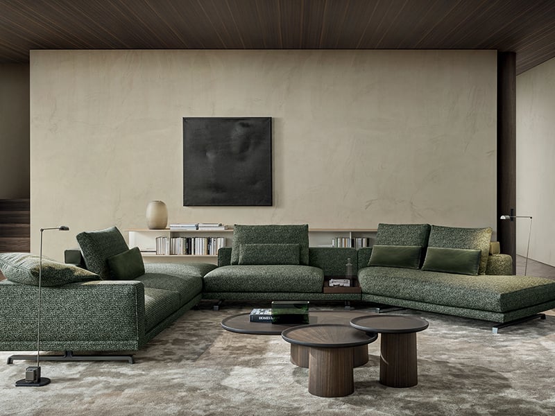 Green Octave sectional sofa in front of beige wall