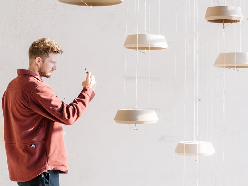 Man taking photo of work by Jonne Stout at OBJECT Rotterdam 2020