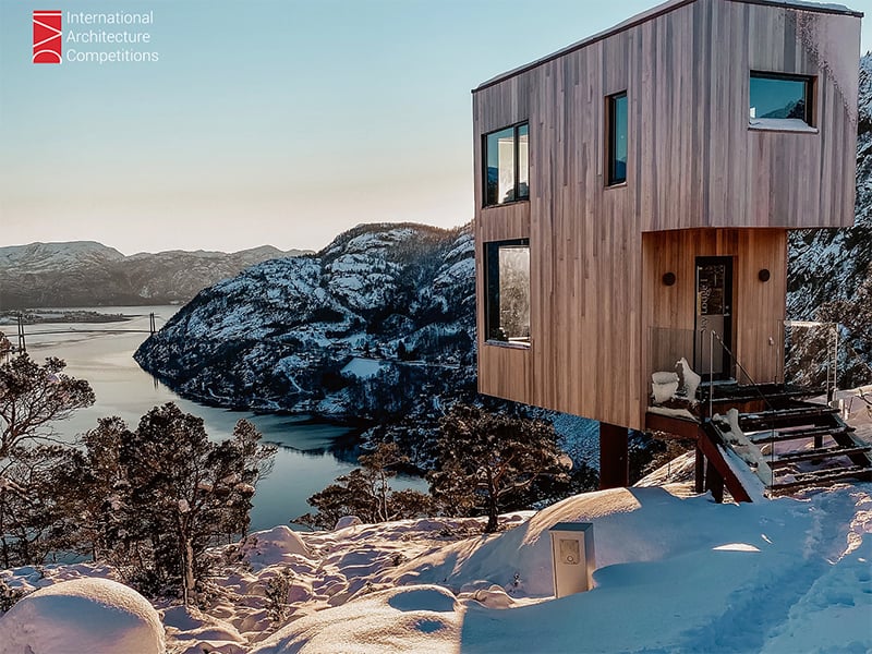 Modern wooden cabin overlooking the mountains