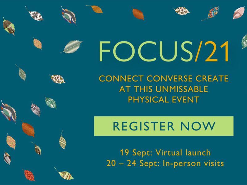 Blue background with patterned leaves. Text reads: Focus/21: Connect, converse, create at this unmissiable physical event