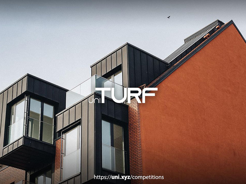 Red and metal building. Text reads: Uni Turf