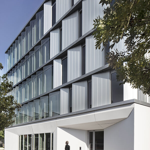 Exterior view of office in Lille, France, showing louvre system