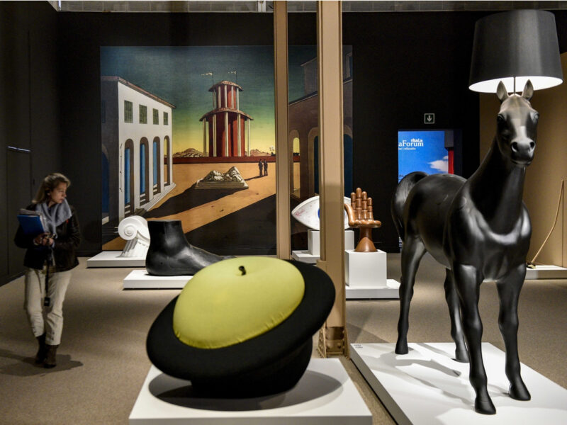 The objects of desire surrealism and design 1924 today exhibition at the Vitra Design Museum in Germany featuring a horse shaped lamp, hand chair and apple in hat.