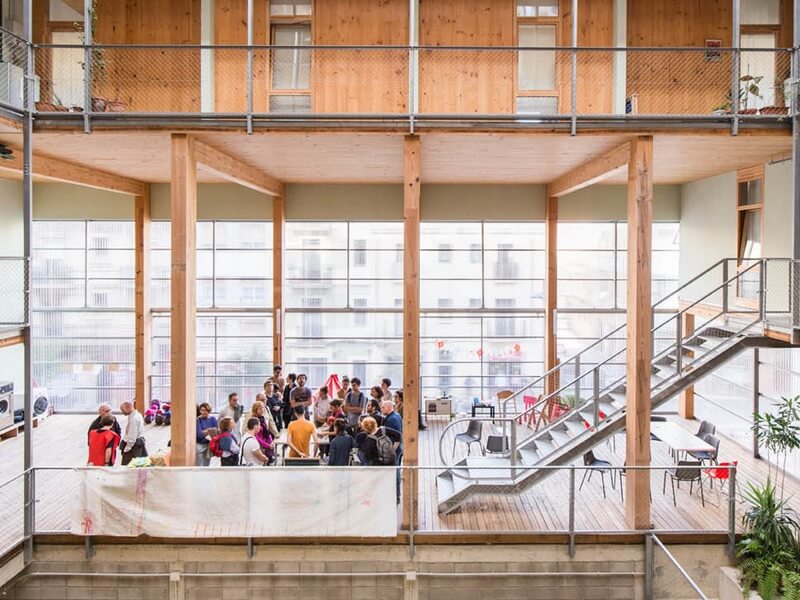 Lacol: Community Infrastructure lecture in community centre lobby