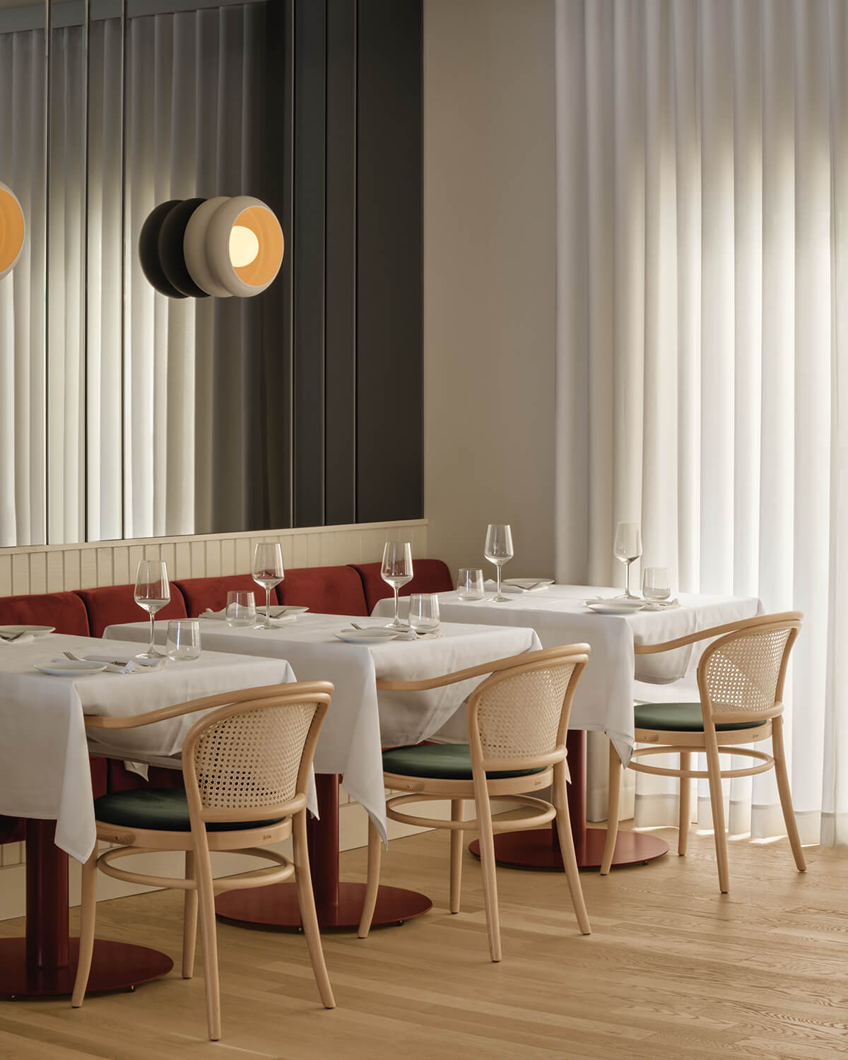 Dining room at Restaurant Piatti features furniture by Ton