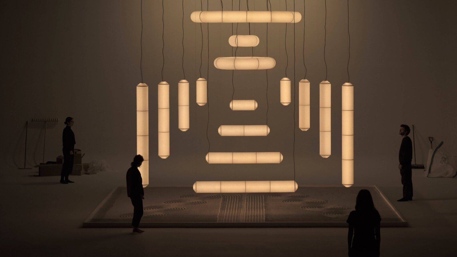 Tekio paper lamps with silhouetted people