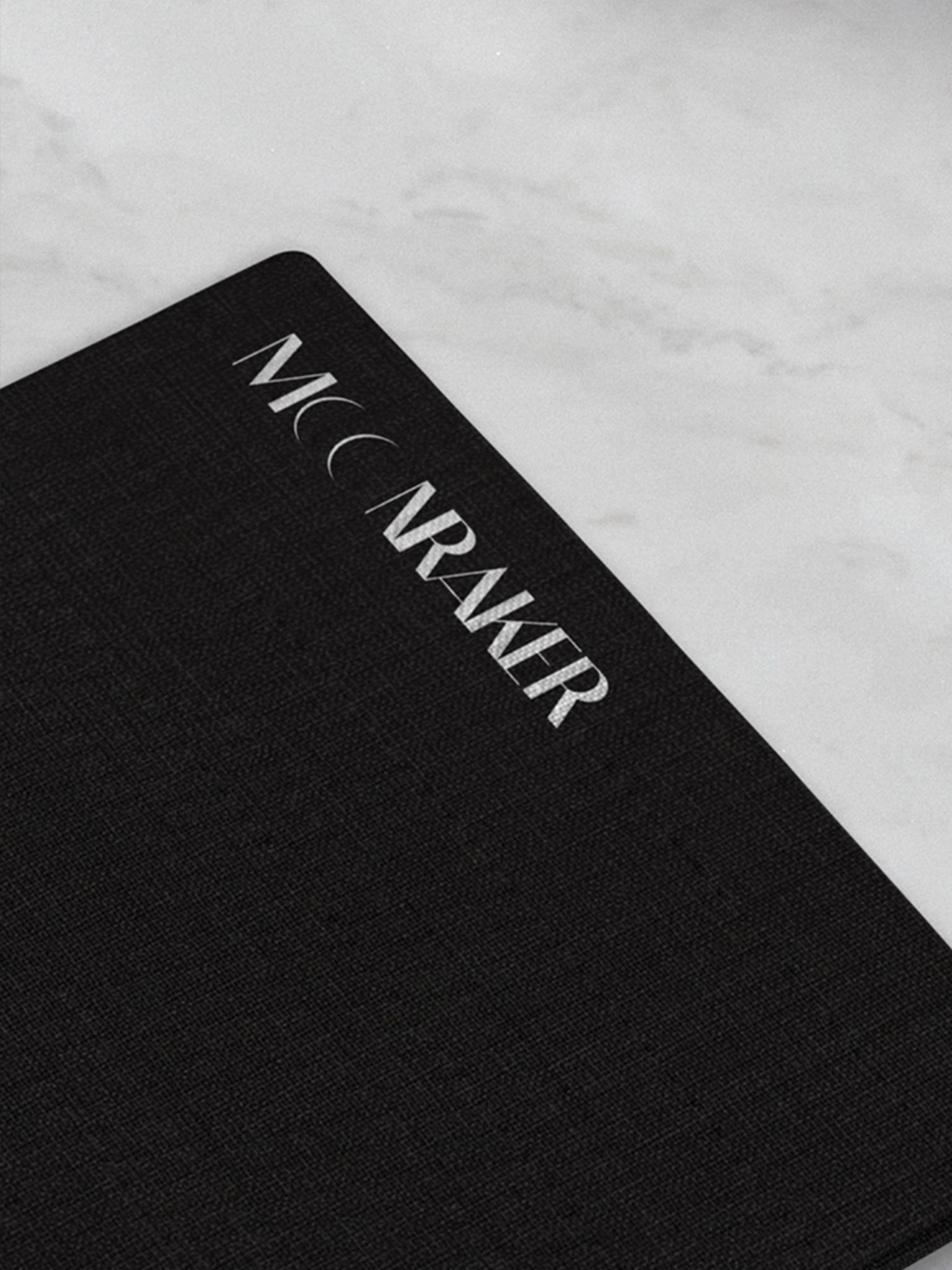 A menu showing the logo for the Moonraker bar.