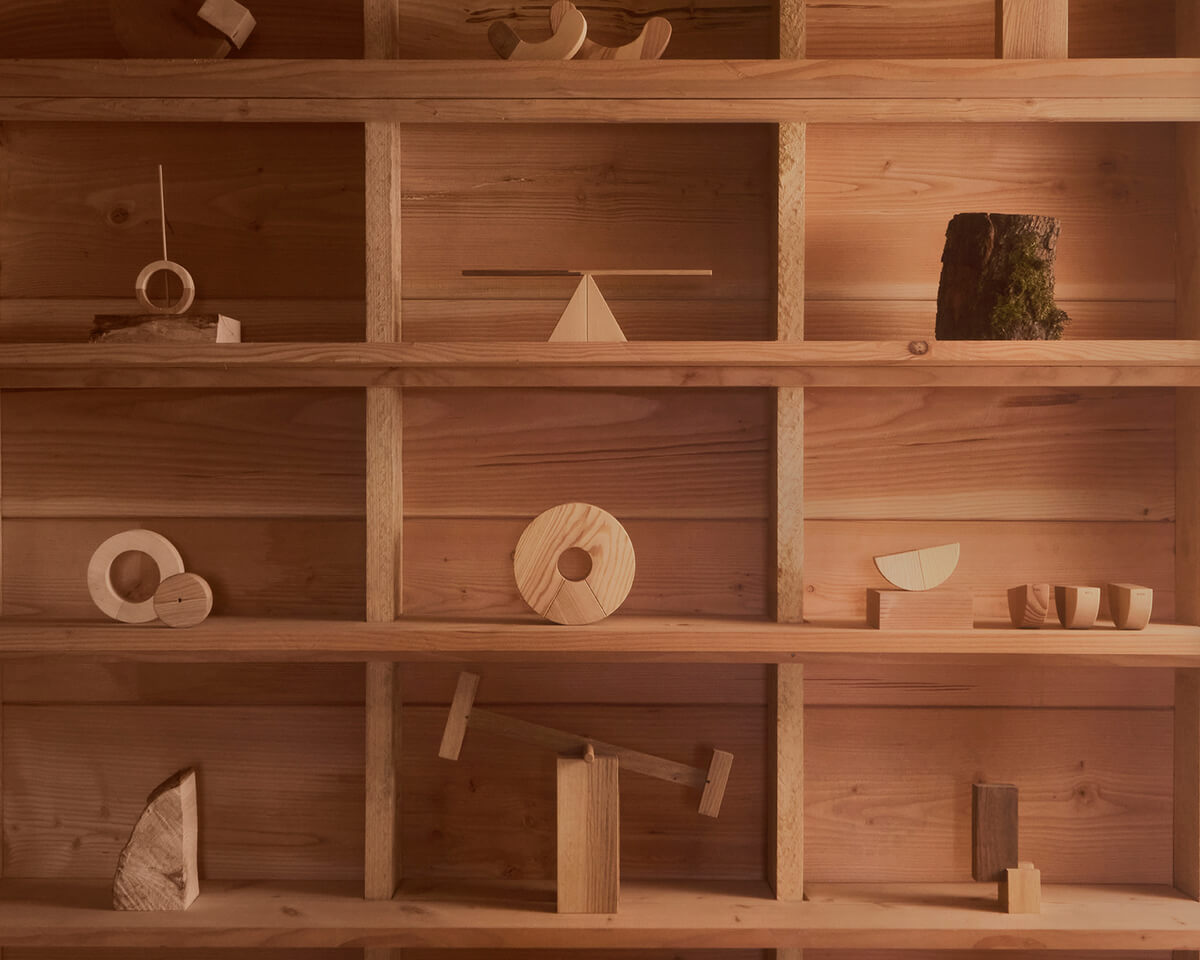 Wooden shelf displaying wooden objects