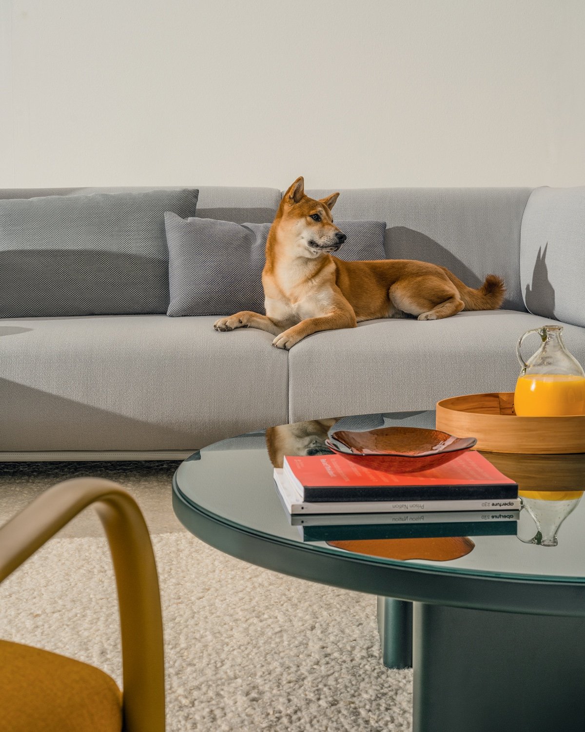 Roopa Table Collection by Doshi Levien for Arper mixes glossy and matte finishes