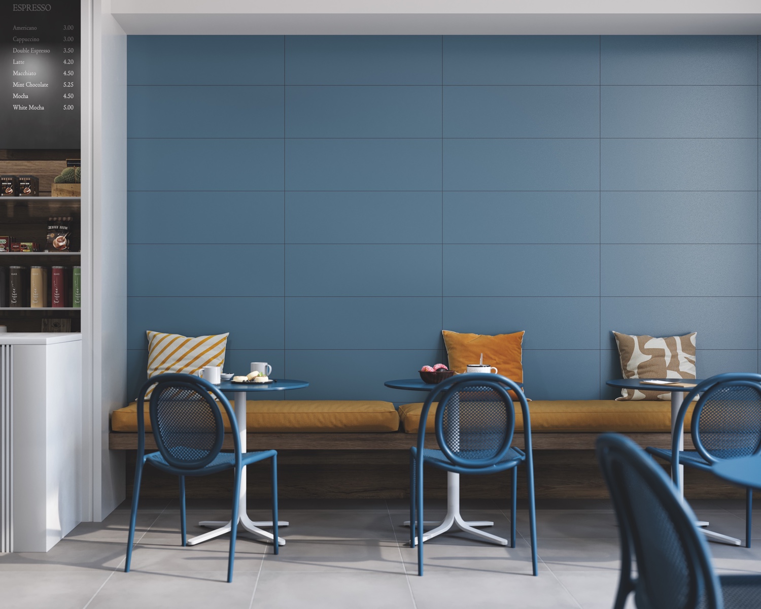Blue tiled room with banquette seating