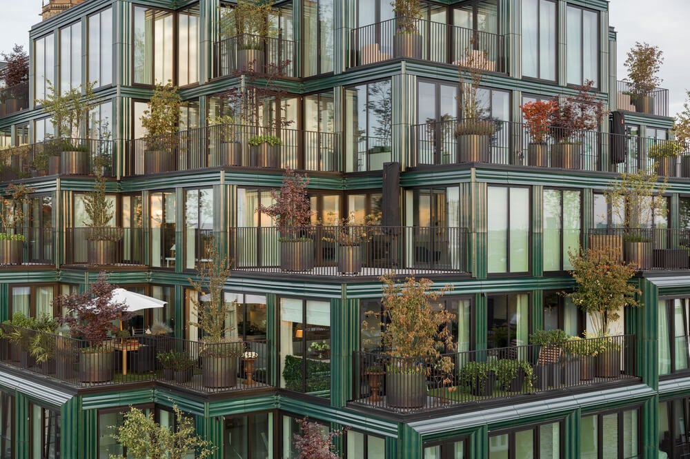 Greenery and Terracotta Frame a Dutch Apartment Complex