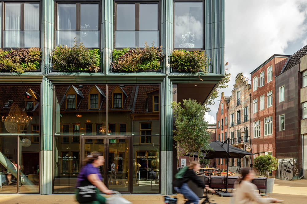 Greenery and Terracotta Frame a Dutch Apartment Complex