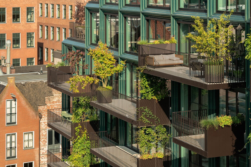 Greenery and Terracotta Frame a Dutch Apartment Complex