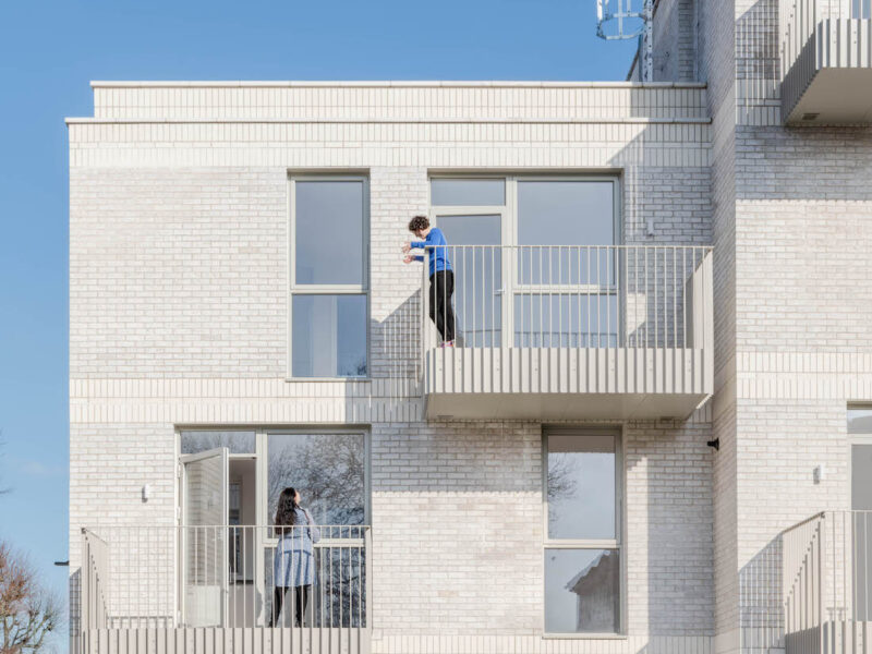 Citizens House was designed by Archio for the London Community Land Trust. The staggered balconies facilitate easy conversations between neighbours, while also sheltering the street-level entrances below from the elements.