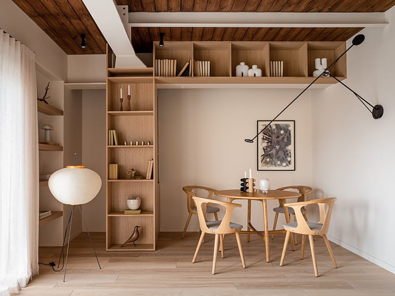 Dining area with wood furniture and millwork