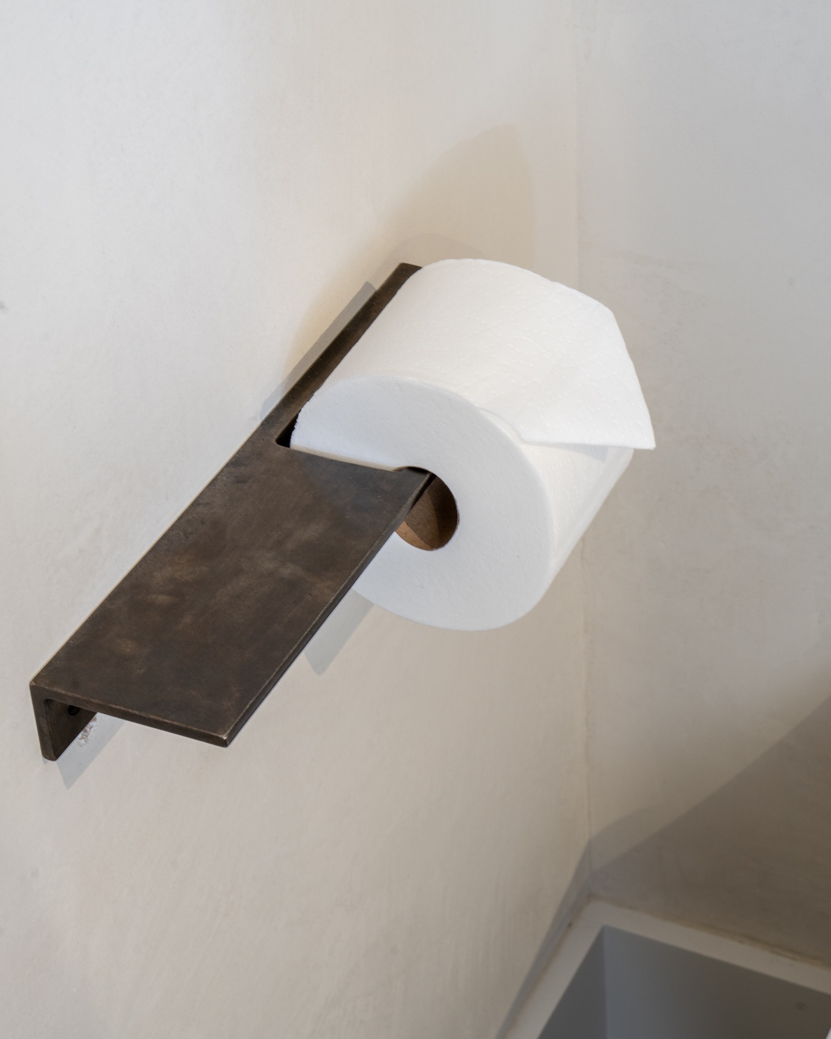 Detour toilet paper holder