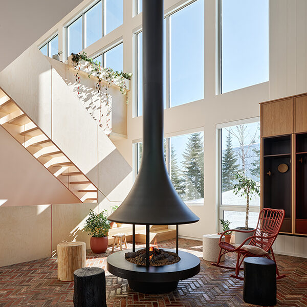 Fireplace surrounded by wooden stools
