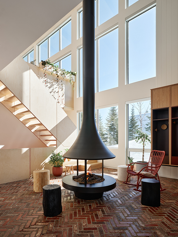 Fireplace surrounded by wooden stools