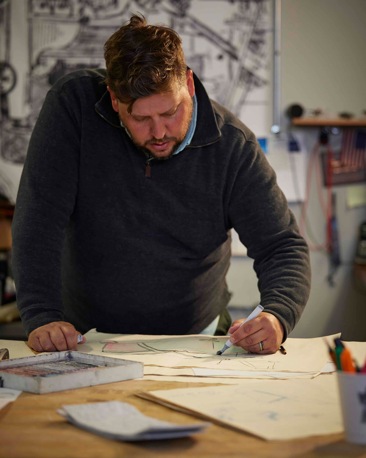 Man sketching furniture designs