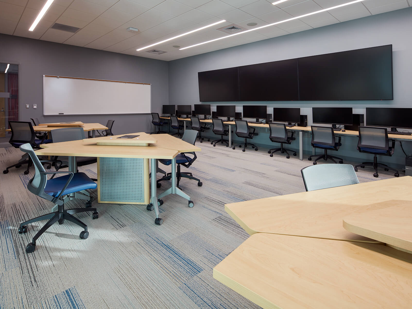 Modified Backbone and Pirouette Tables, custom designed for Bradley University by contract furniture manufacturer KI