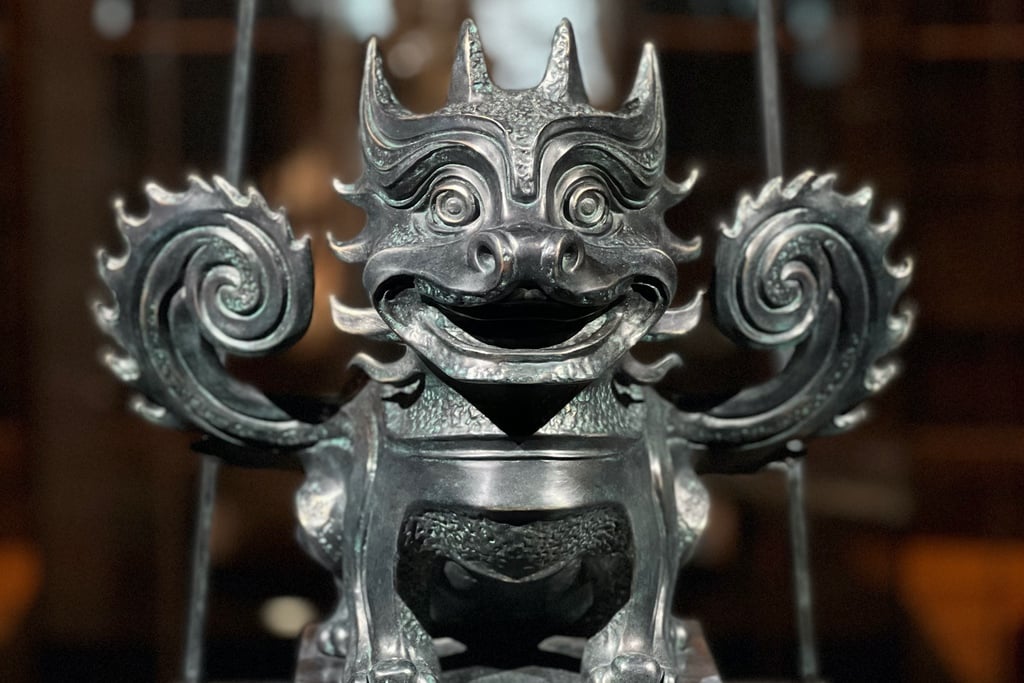 A gargoyle-like dragon with curled wings created by designer Jiang Qiong Er for an exhibition at the Guimet in Paris.