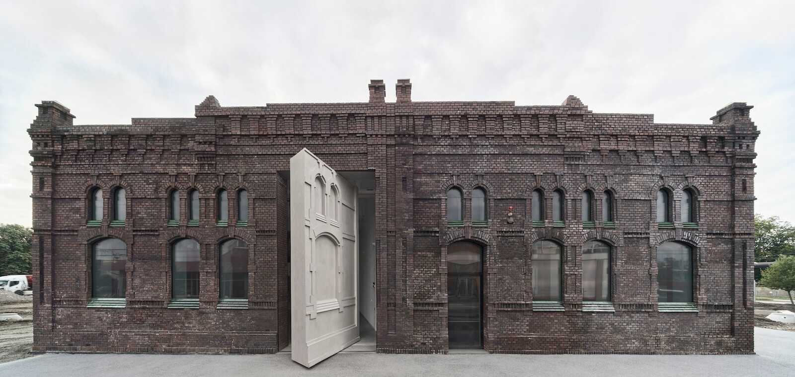 A more pulled out view of the KWK Promes's entrance for Plato