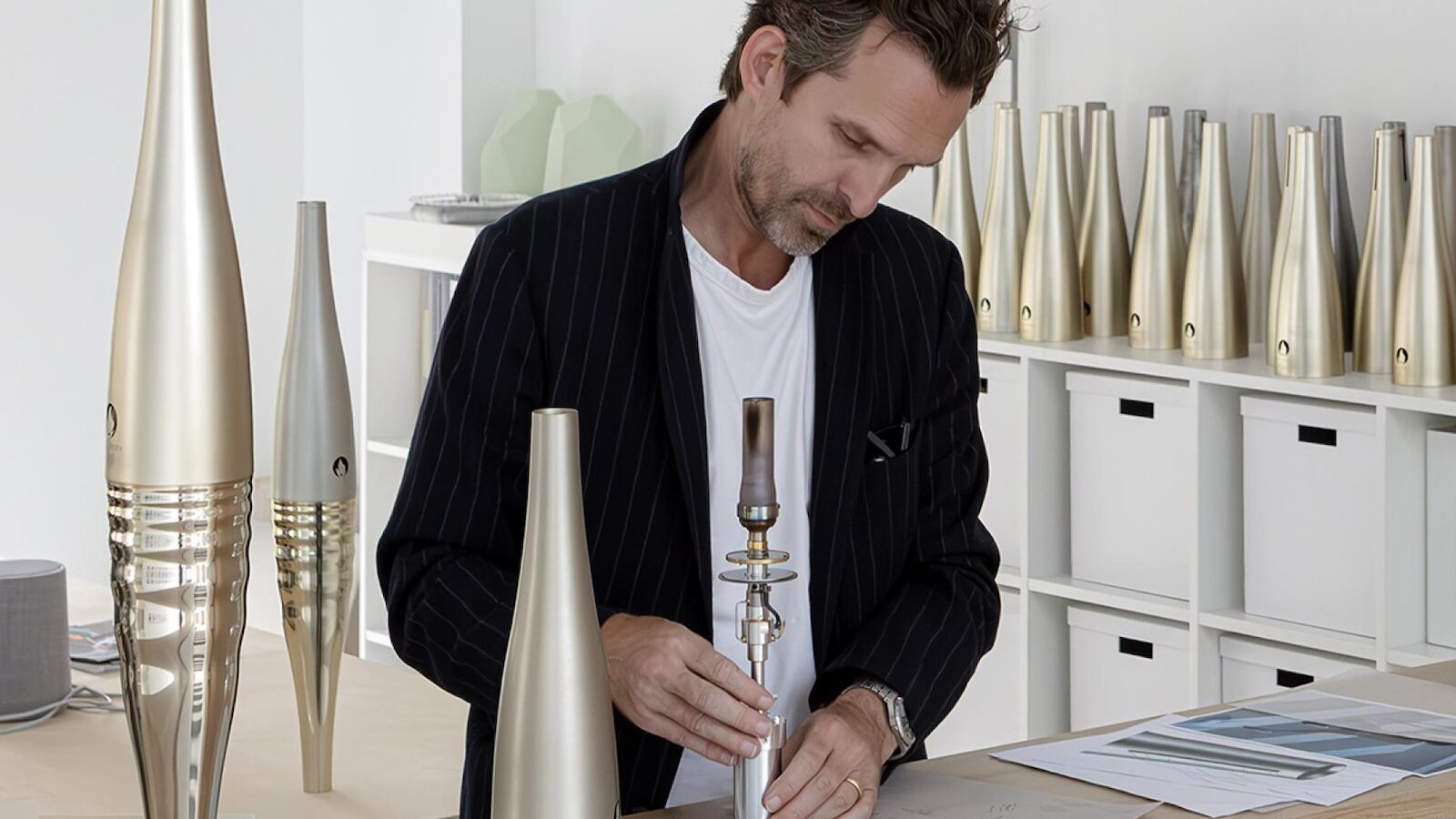 Portrait of Mathieu Lehanneur with his torch design