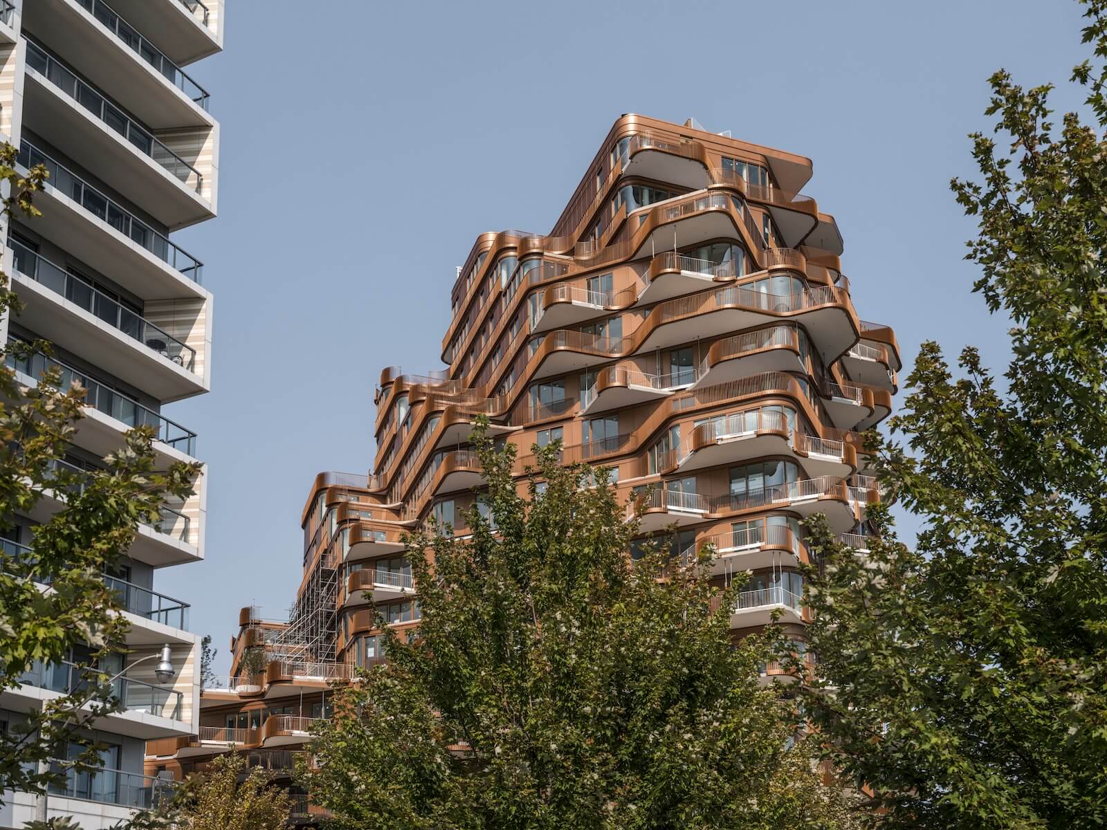 The 16-storey Aqualuna at East Bayfront Toronto houses 240 luxury condo units, a large sixth-floor amenity terrace and a pool.