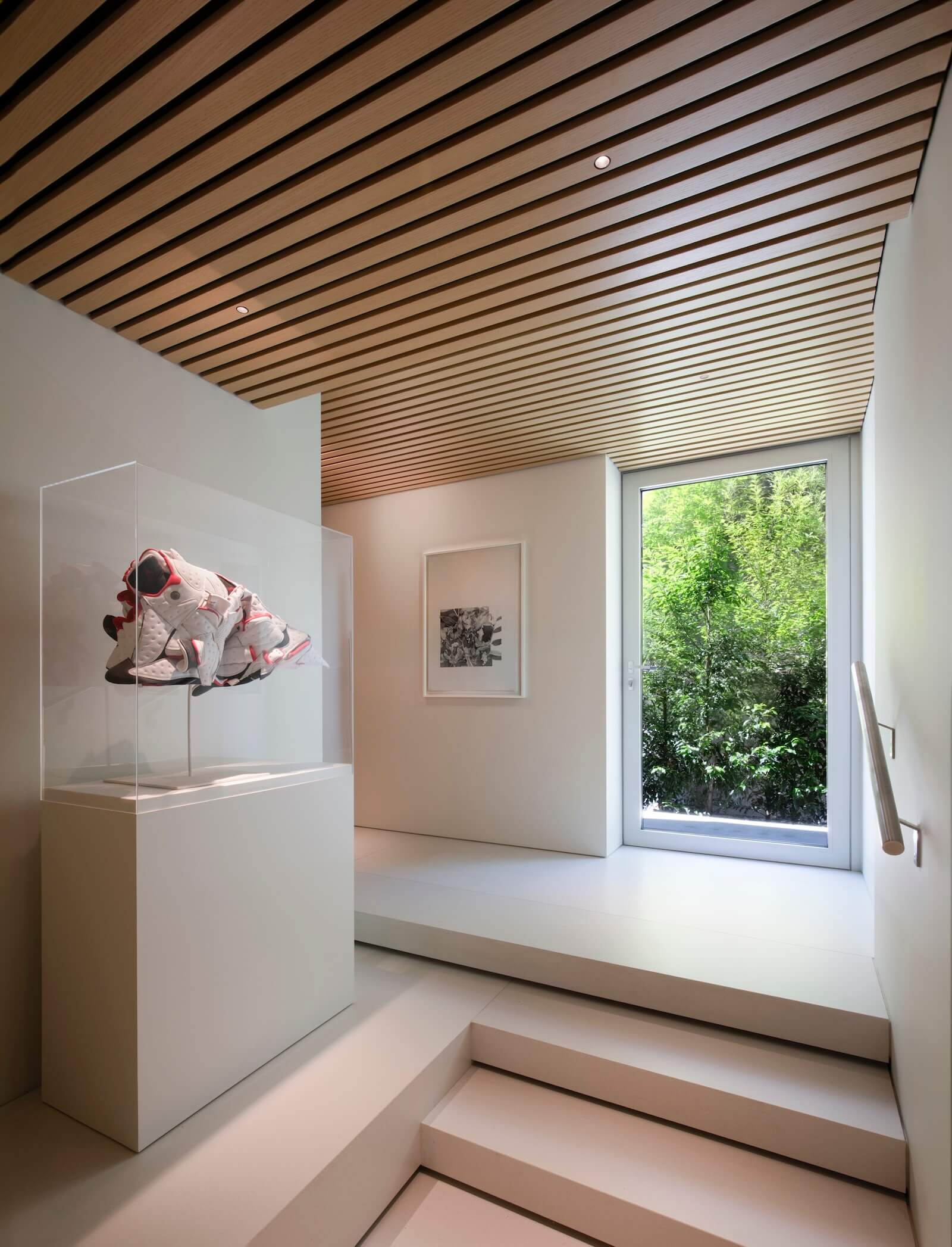 The homeowner’s enviable art collection includes Plague Mask 3 (fever dream) by BC-based Indigenous Canadian artist Brian Jungen.