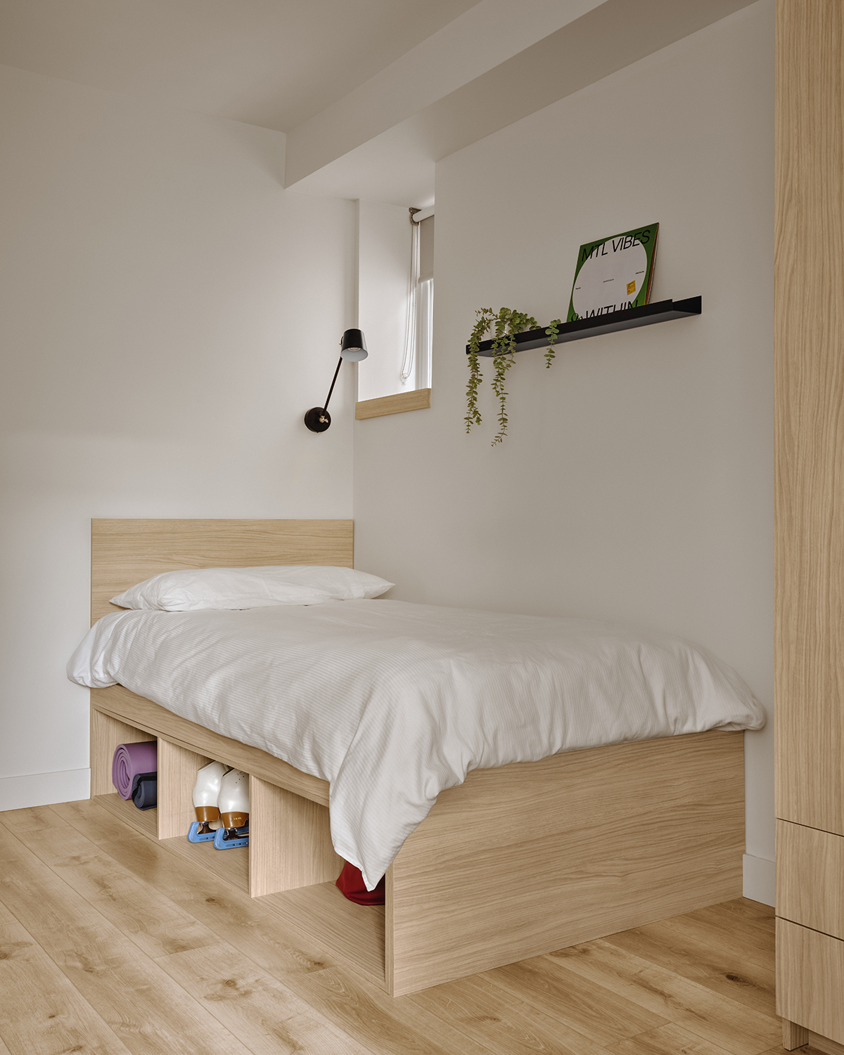 Student dorm with wooden bed
