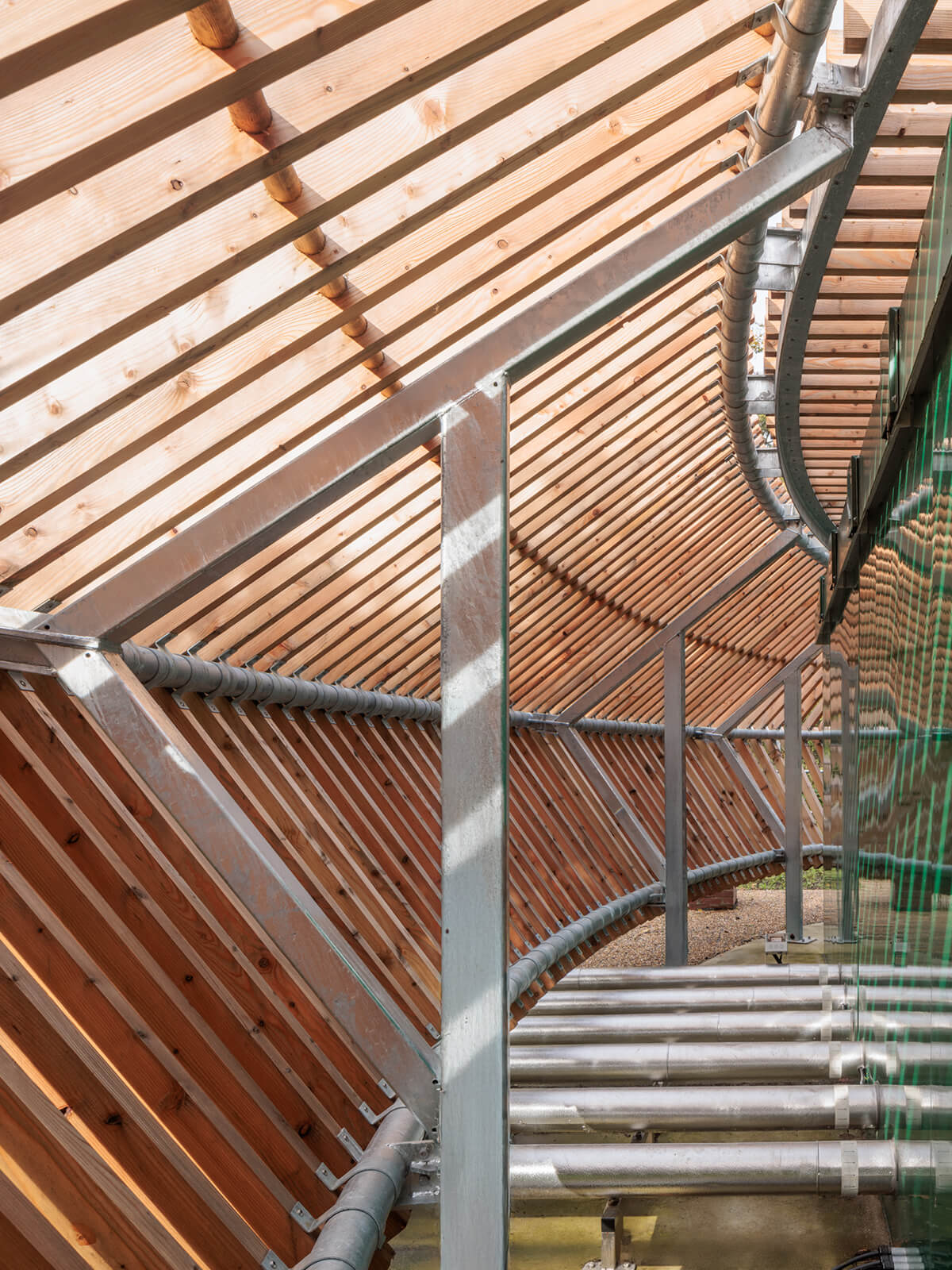 Slatted timber pump house structure, interior view