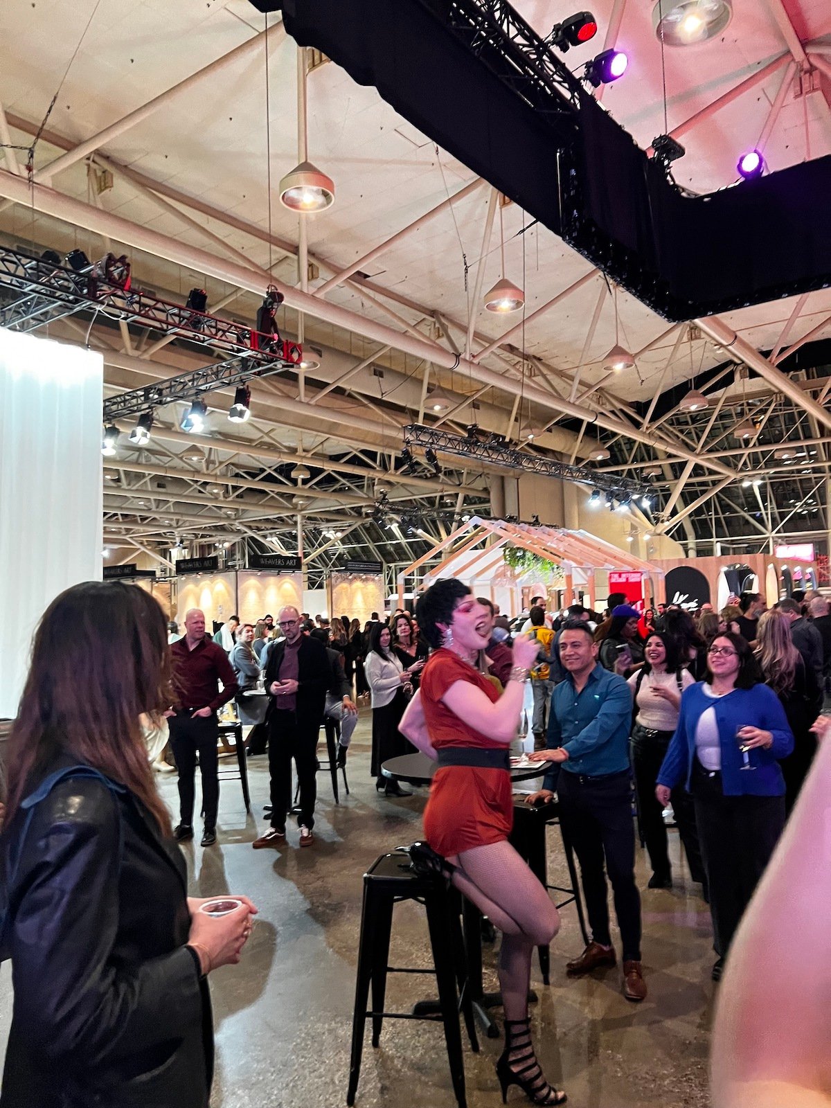 A vocal performance by drag queen Regina Gently at IDS 2025.