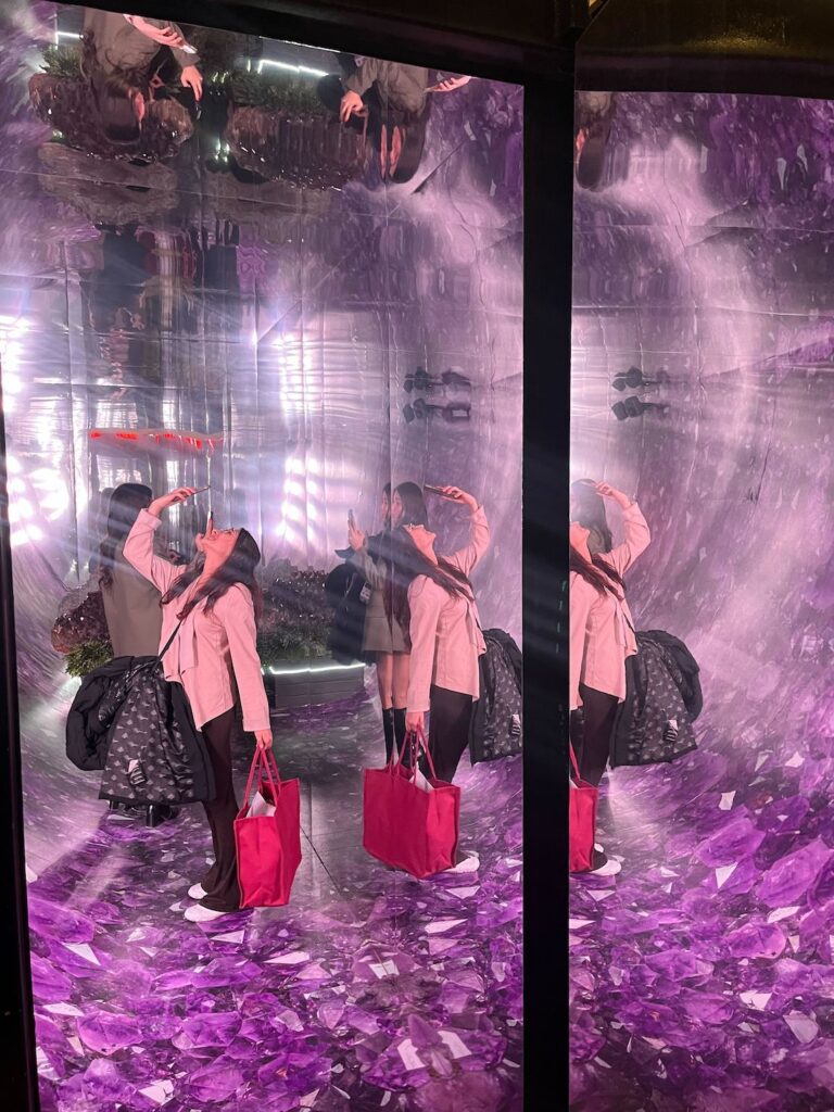 IDS 2025 visitors photographing the Rollout and Coolab hotel spa space.