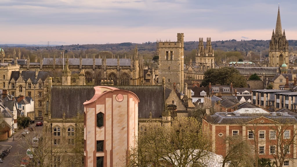An aerial view of Oxford University campus, showing the seven-storey tower of Gradel Quadrangles alongside the university's other neighbouring towers.