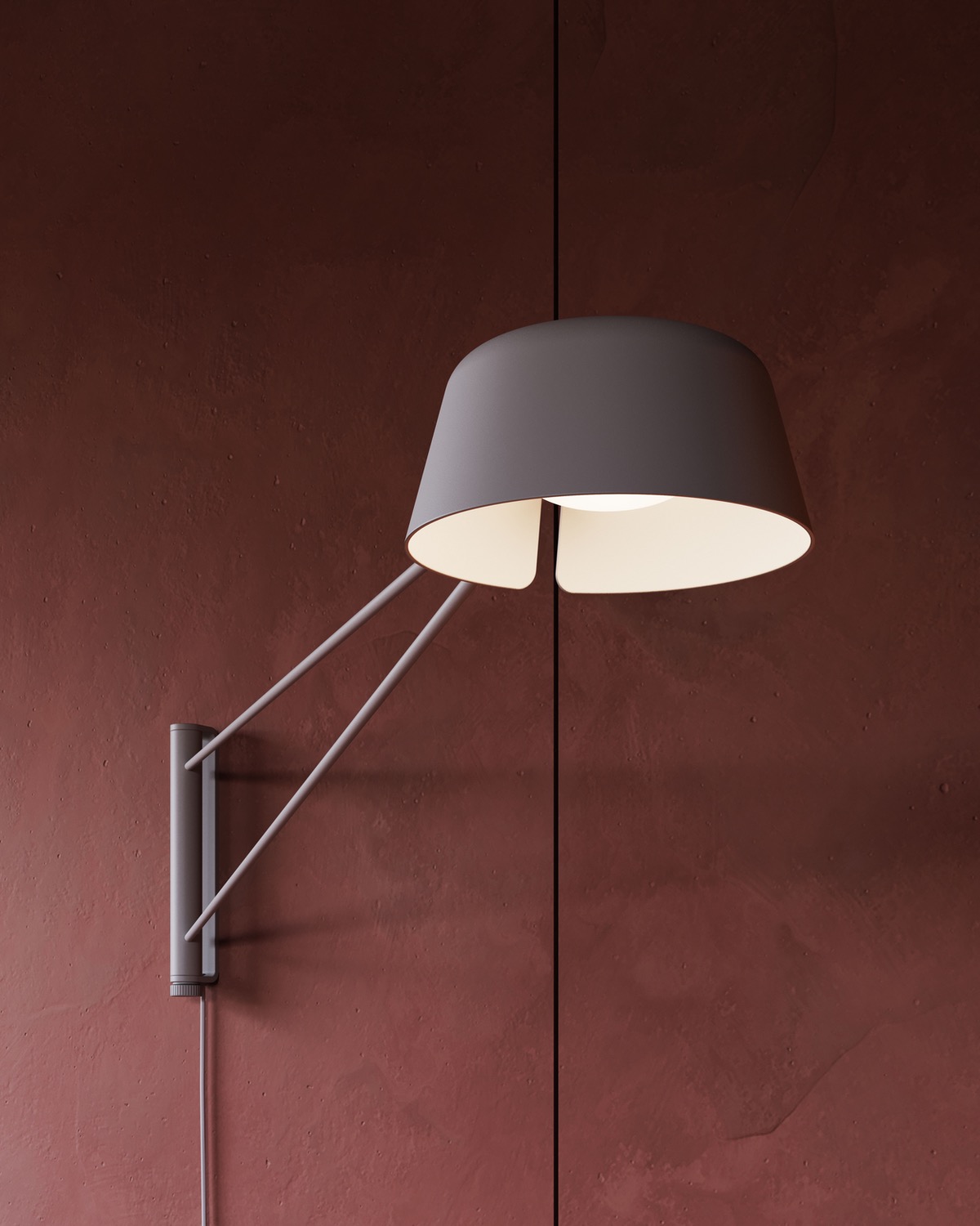 Grey wall lamp on a red wall