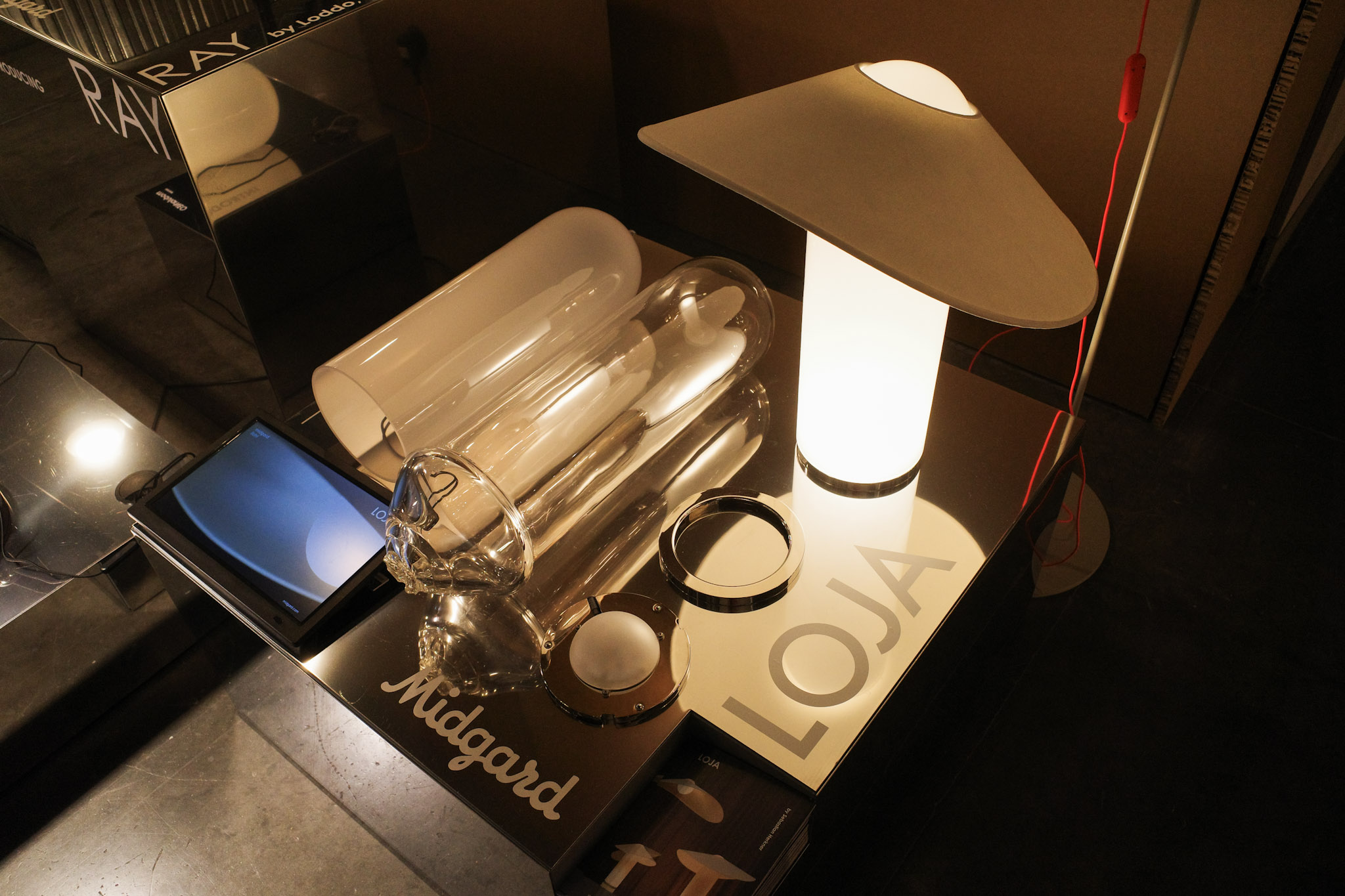 A new table lamp lighting launched with a curved paper shade at Euroluce during Salone del Mobile 2025.
