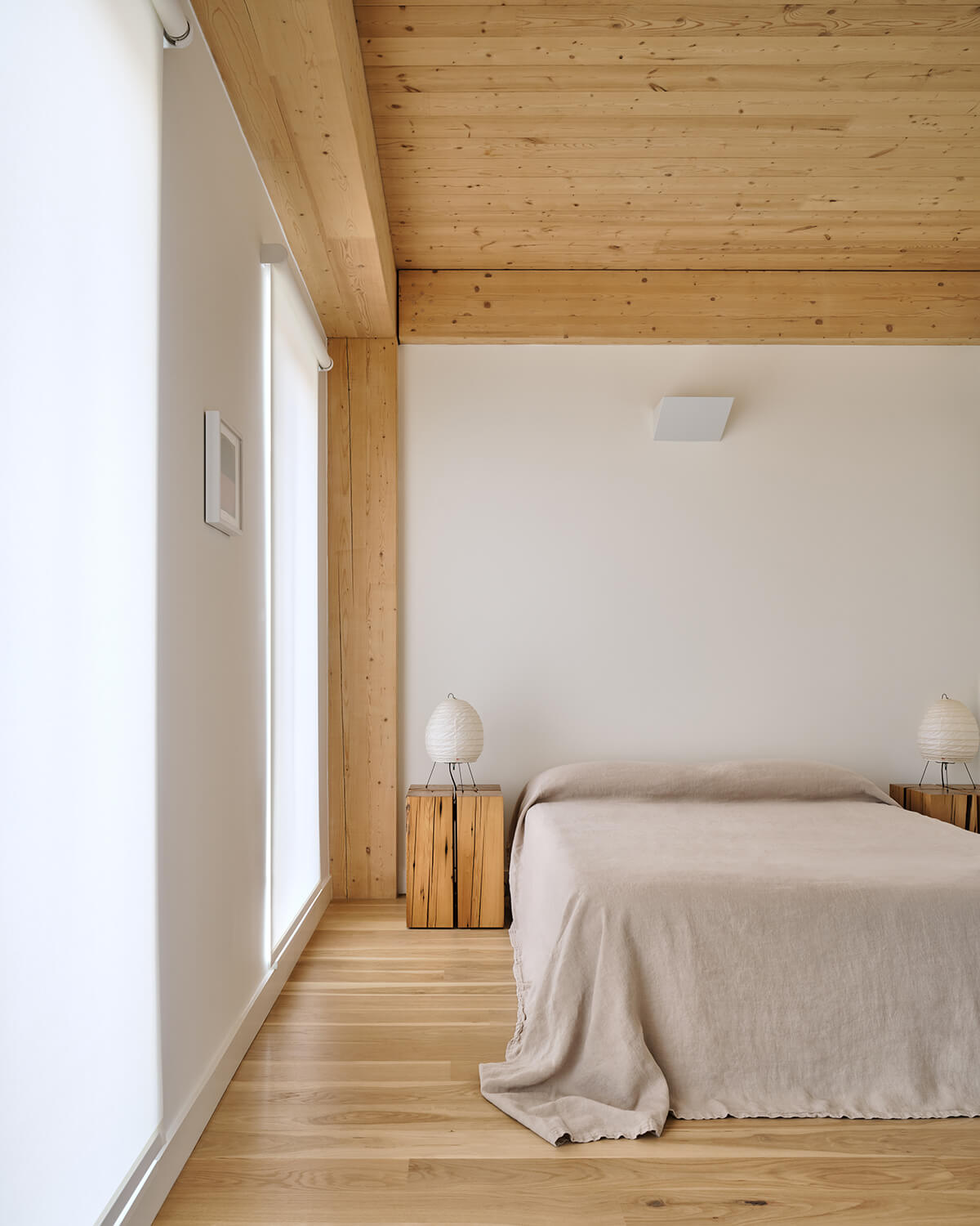 Bedroom with exposed mass timber structure