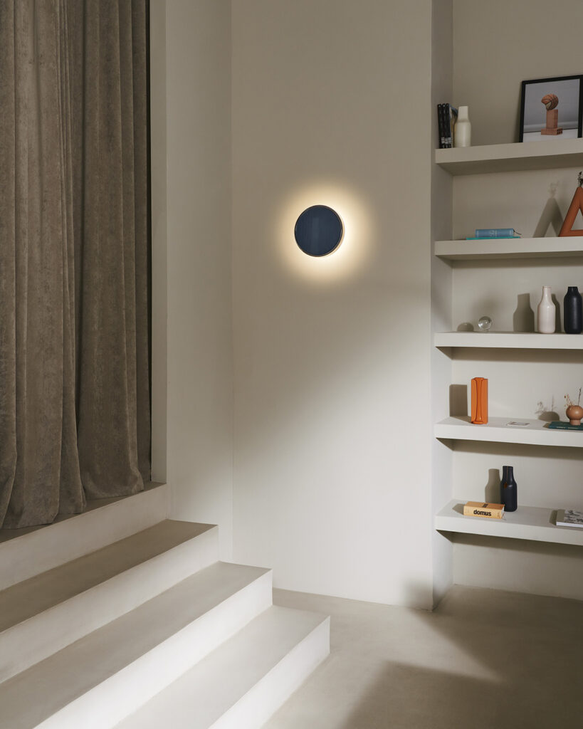 Blue circular glass sconce