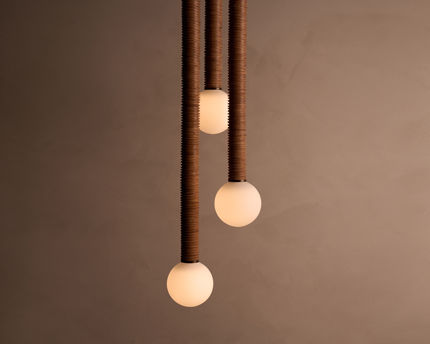 The Pell chandelier from Studio Luddite comes in three leather options