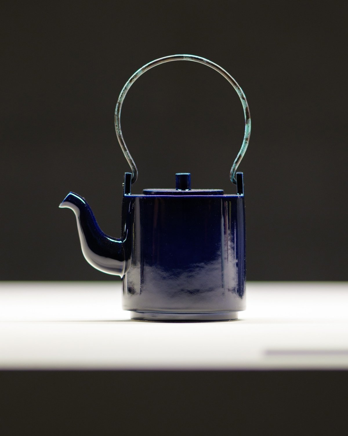 A cobalt blue pot by David Chipperfield was one of the designs at a typology exhibition showcasing many types of teapots.
