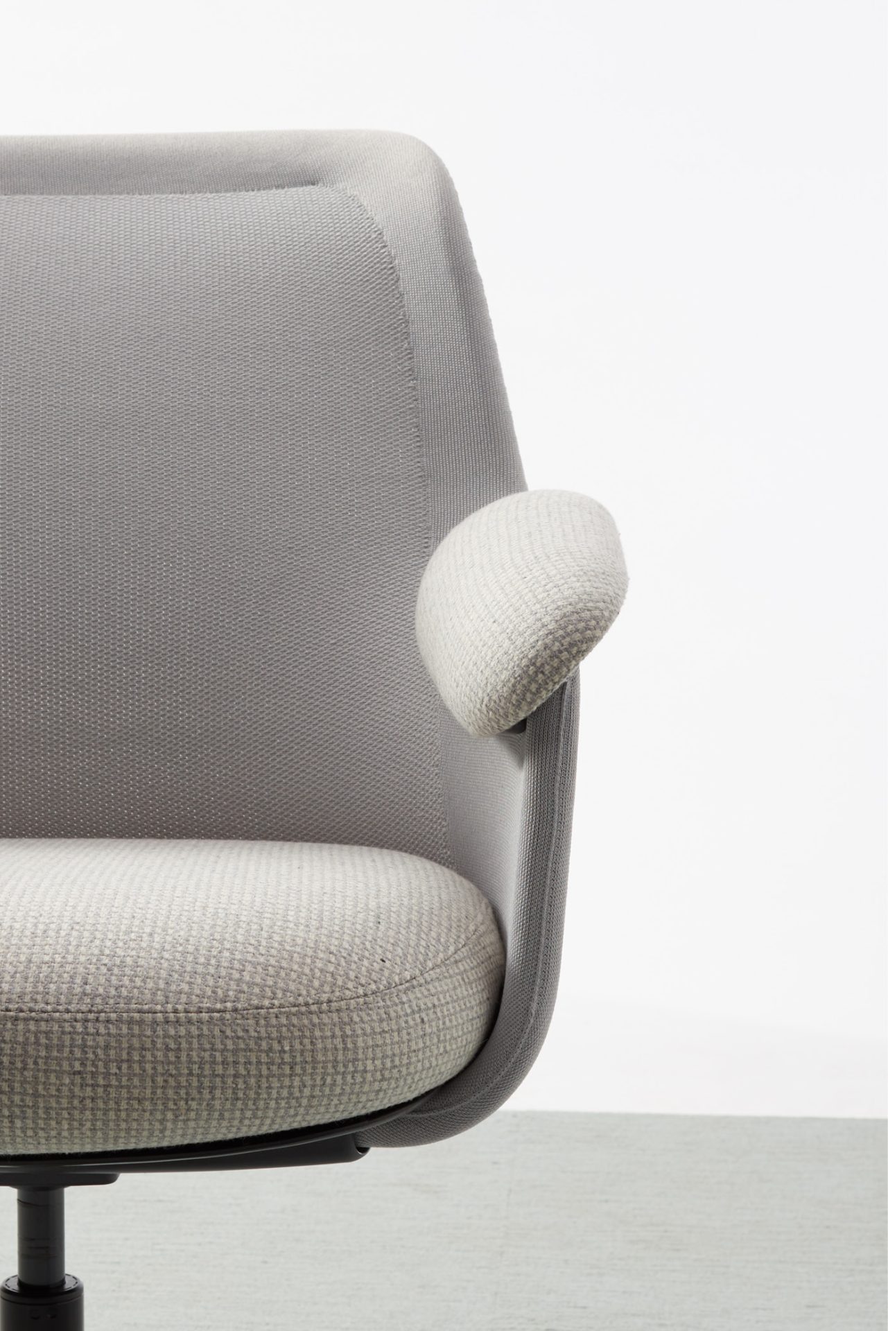 The Aarea chair is designer for an era of workplace uncertainty. Design detail of armrest shown.