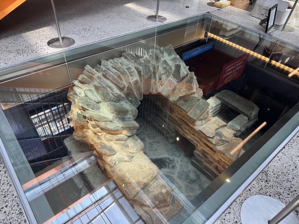 A view of the former brick vault sewage system discovered during construction.