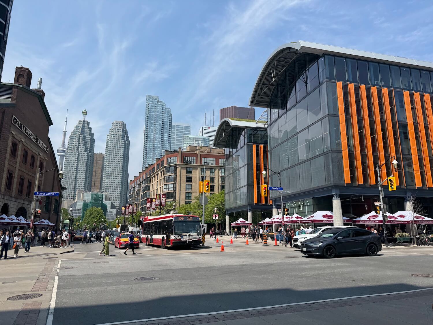 On market day, stalls frame the building, bringing its energy to the street.
