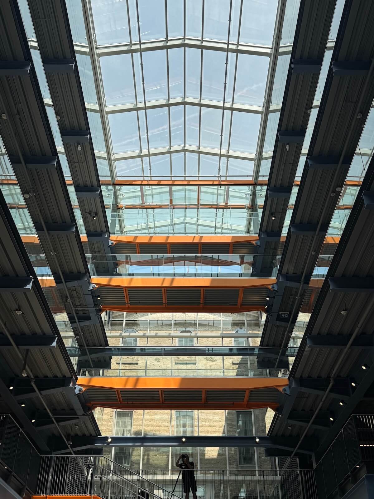 The central atrium opens up a view corridor between St. Lawrence Hall and the older market building to the south.Looking up to St. Lawrence Hall, which is visible behind the glass.