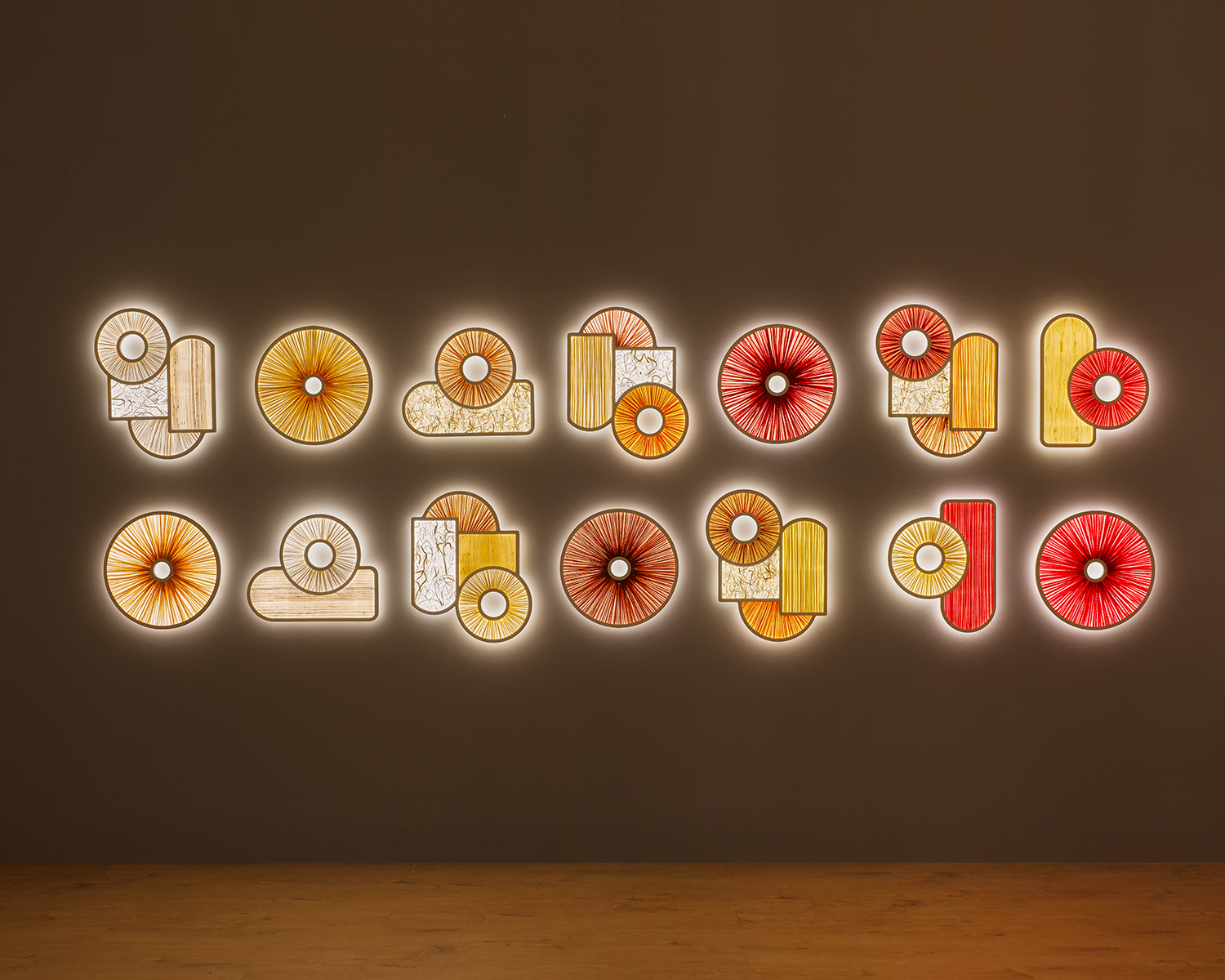 14 Miami 1 wall lights against a brown wall